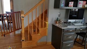 Dr. Paint Inc. Before: Cabinet Painting Ocala IL - Dark wooden desk before Professional Painting Services