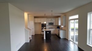 Dr. Paint Inc. Before: White kitchen cabinets requiring Cabinet Painting Ocala IL service